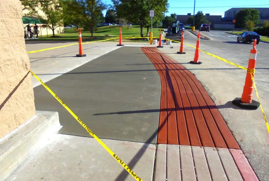 new constructed concrete walkway & red brick walkway