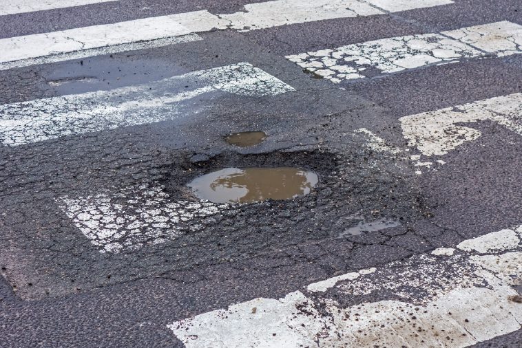 Read more about the article Protect Your Parking Lot From Potholes | Asphalt Paving Company, Wichita, KS