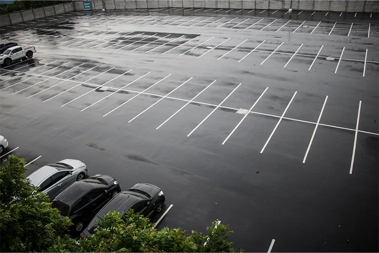 Read more about the article How Spring Rainfall Is Affecting Your Asphalt Parking Lot | Asphalt Paving Company, Wichita, KS