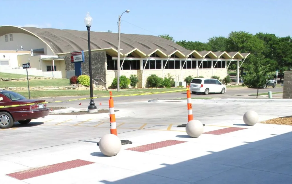 Concrete walkway in front of the Winfield Public Library.
