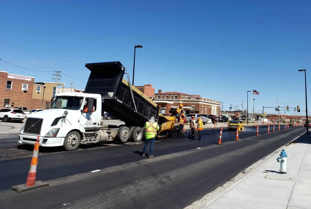encore pavement employees working on a street in el dorado