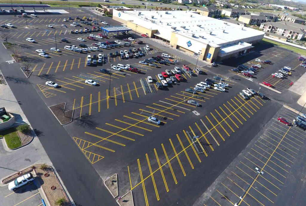 An aerial view of Sam's Club new asphalt parking lot with new line striping.
