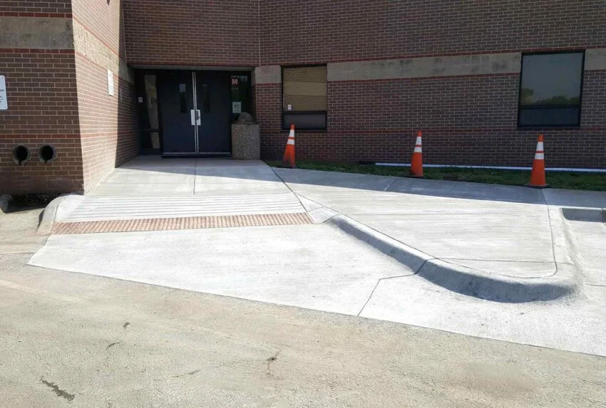 New concrete sidewalk entrance to Andover Schools