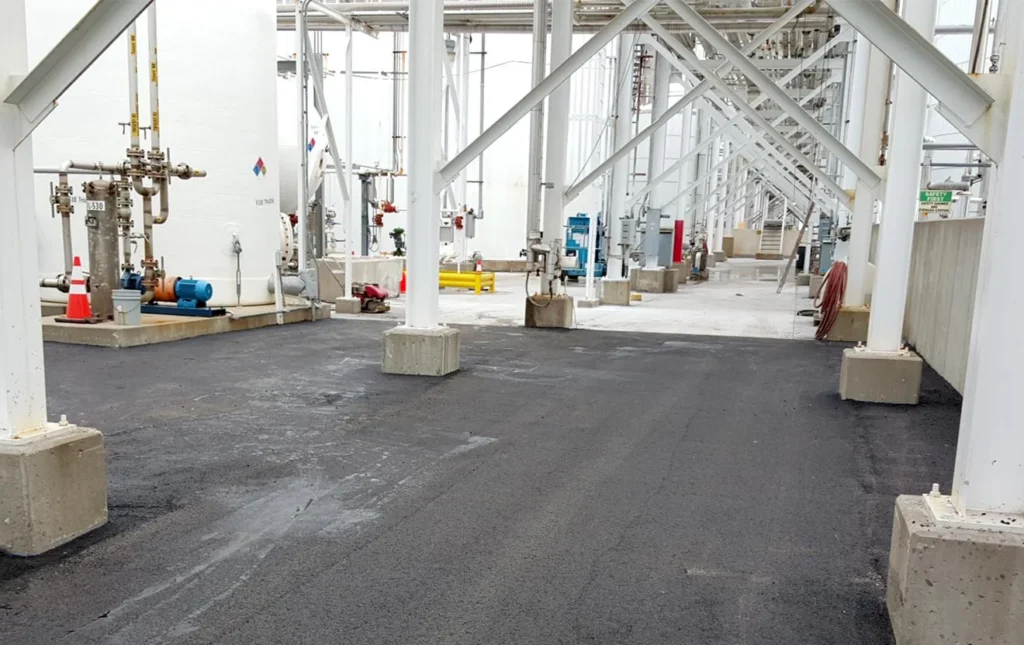 asphalt pavement and posts at coffeyville refinery