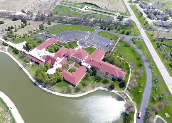 birds-eye view of spiritual life center and pond