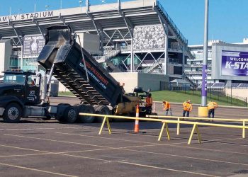 encore pavement dump truck at bill snyder stadium
