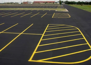 yellow parking lot stripes at maize high school