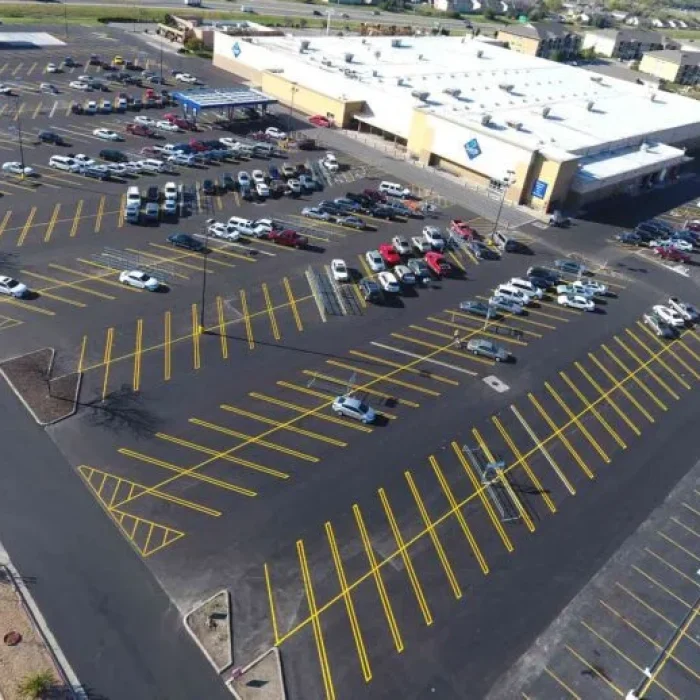 An aerial view of Sam's Club new asphalt parking lot with new line striping.