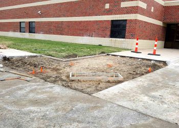 unfinished concrete sidewalk at andover schools