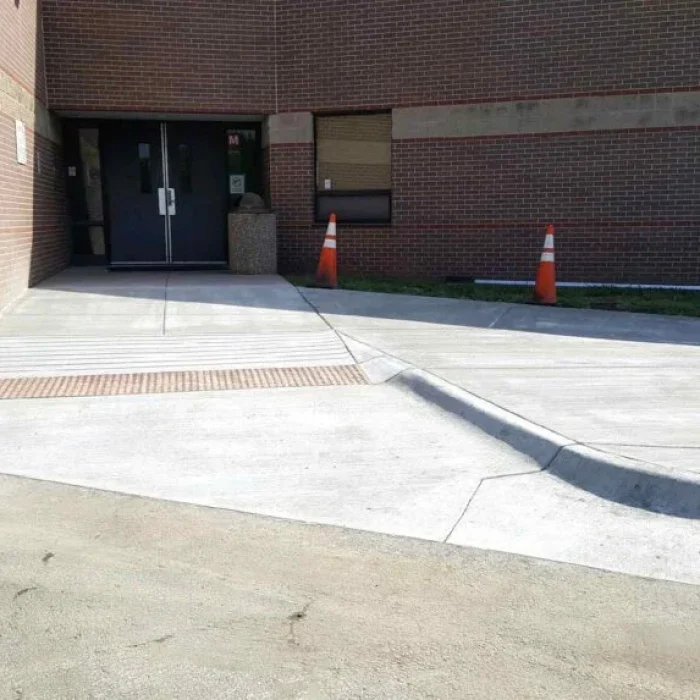 New concrete sidewalk entrance to Andover Schools