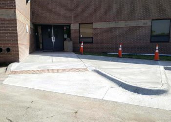 concrete curb and entrance to andover schools