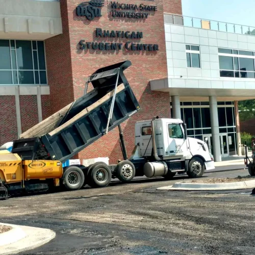 encore pavement dump truck in front of WSU Rhatigan student center