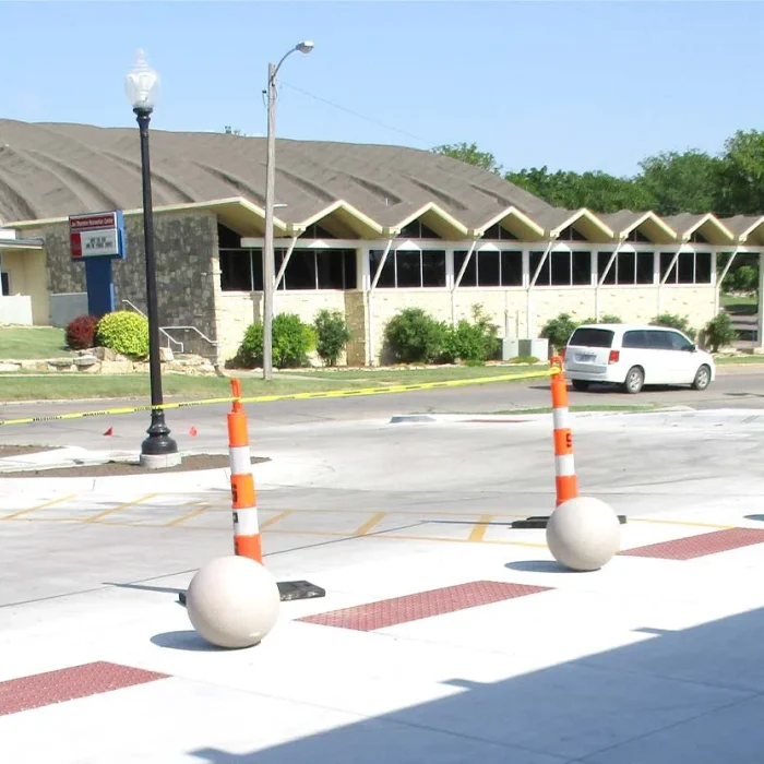 Concrete walkway in front of the Winfield Public Library.