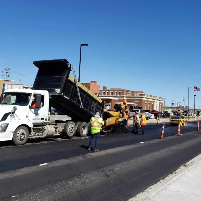 encore pavement employees working on a street in el dorado