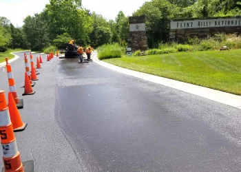encore pavement employees working on a street