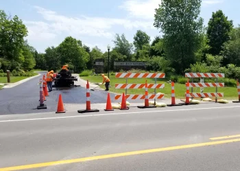 encore pavement employees working at flint hills national golf course