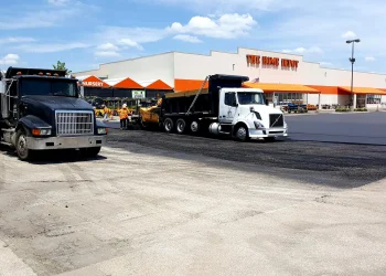 encore pavement dump truck in front of home depot