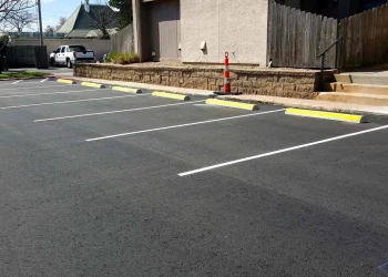 parking spaces and curb stops at horizon east apartments