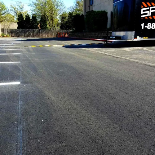 parking spaces and speed bumps at horizon east apartments