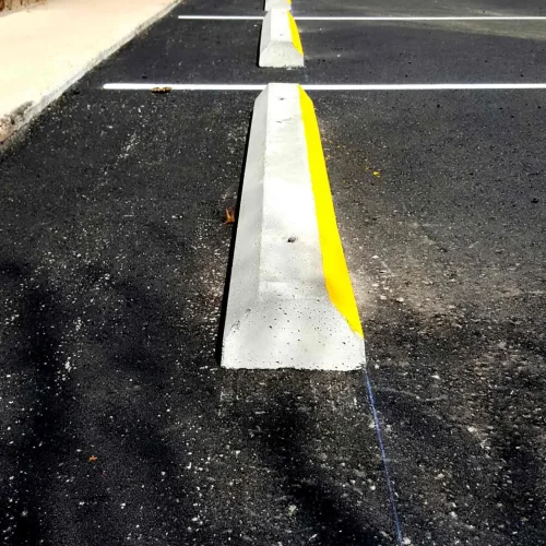 parking curb stops at horizon east apartments