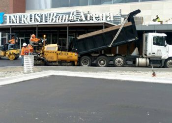 encore pavement employees at the entrance of intrust bank arena in wichita ks
